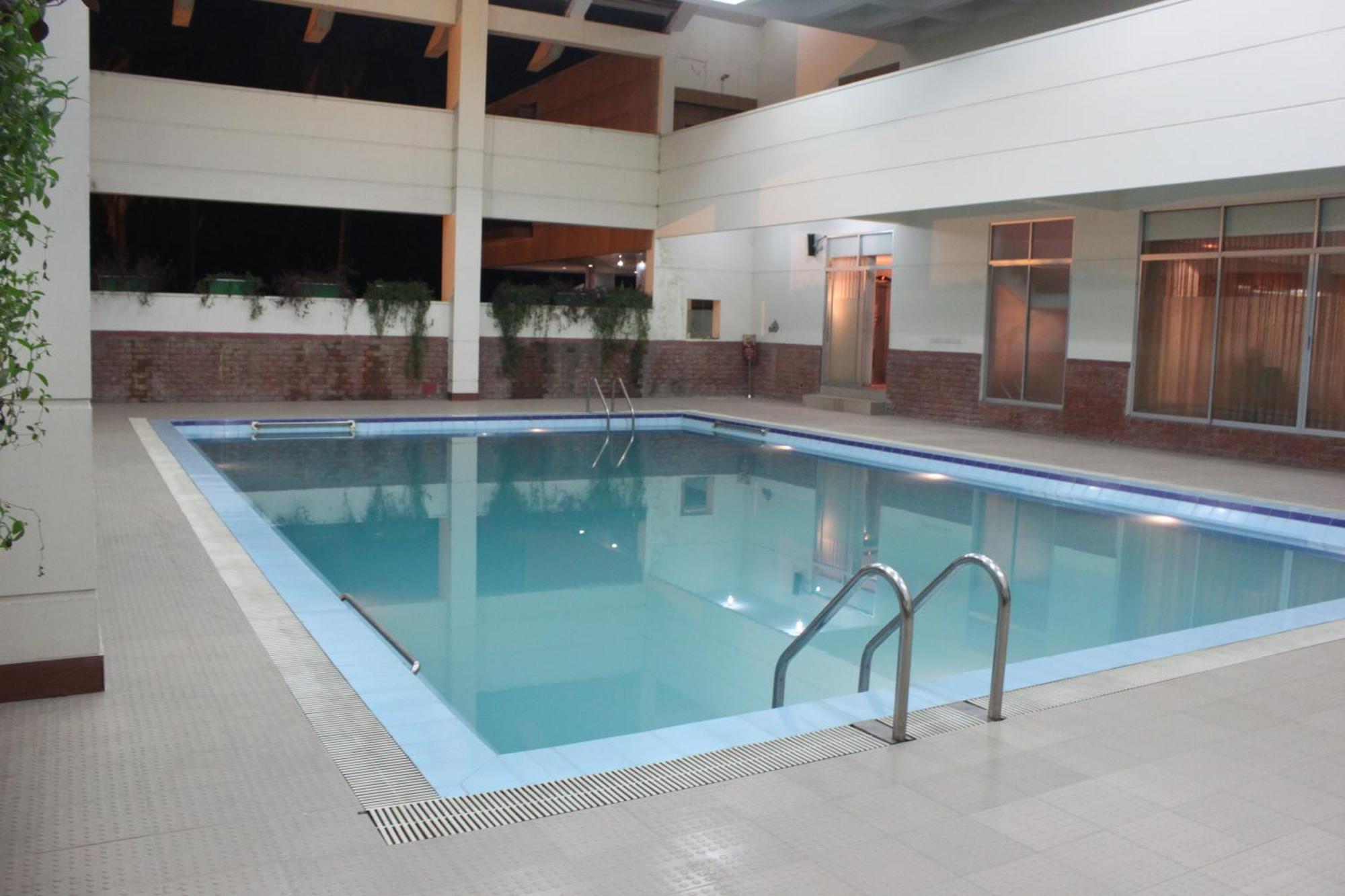 Nirvana Inn Силхет Номер фото