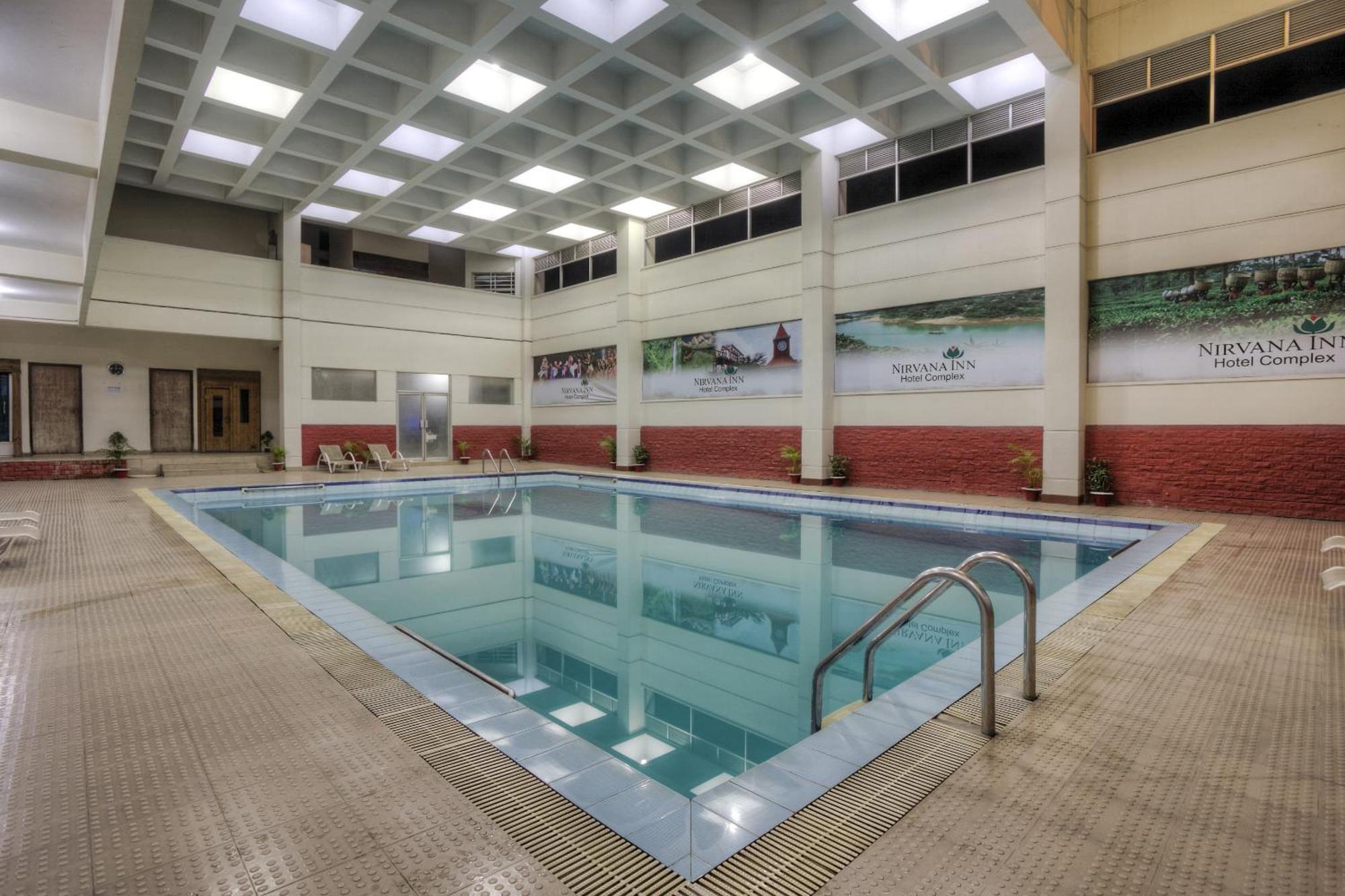 Nirvana Inn Силхет Номер фото
