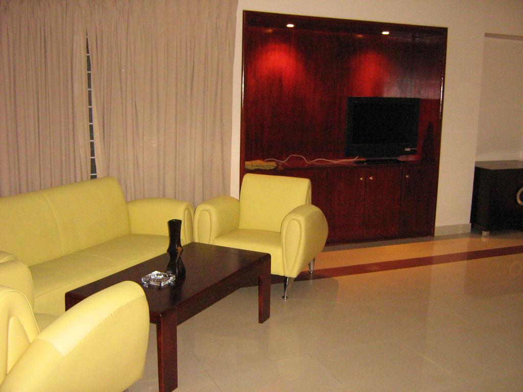 Nirvana Inn Силхет Номер фото
