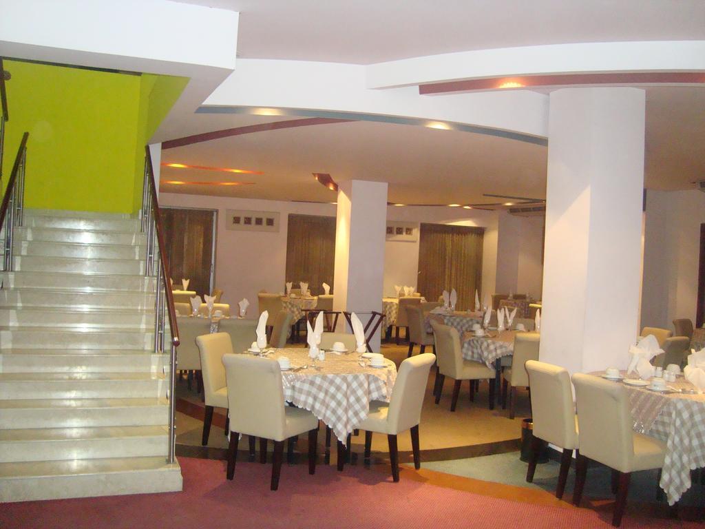 Nirvana Inn Силхет Номер фото
